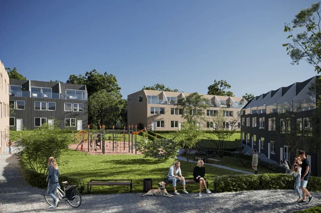 Illustrasjon av rekkehus rundt et tun med lekeplass